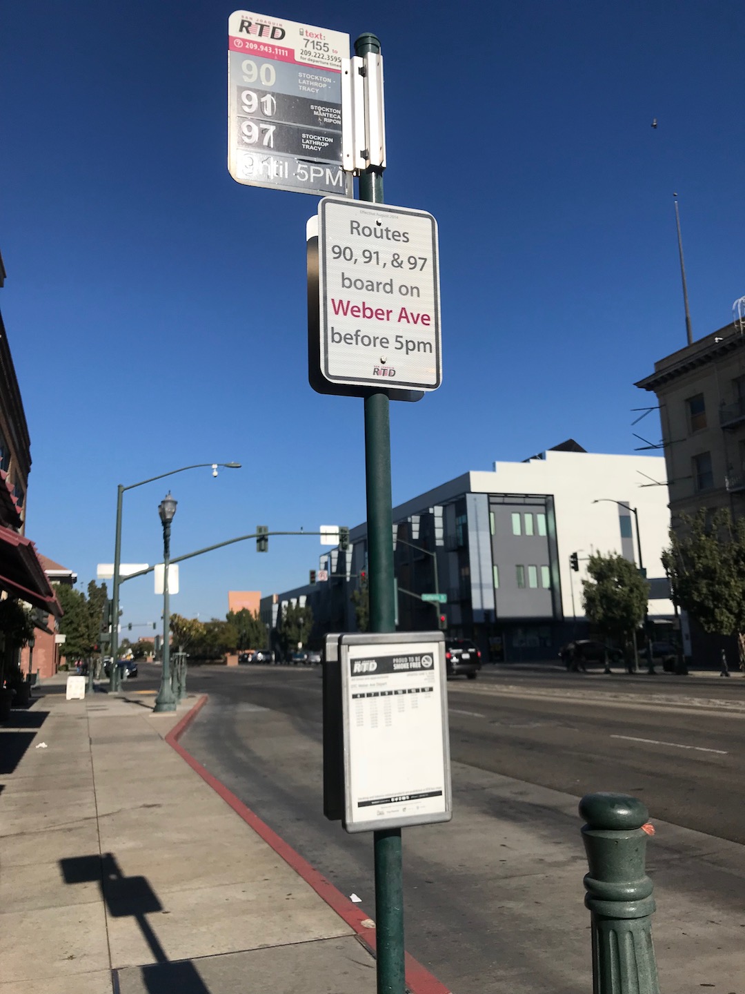 Pole mounted timetable display at a bus stop